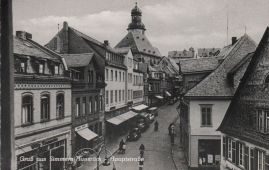 Hier geht es zur Karte mit dem Motiv 'Blick auf die belebte Hauptstraße' Hier geht es zur Karte mit dem Motiv 'Blick auf die belebte Hauptstraße'