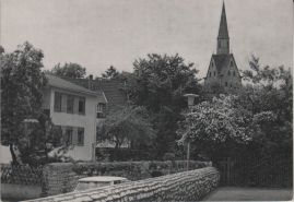 Hier geht es zur Karte mit dem Motiv 'Blick über Bäume zur Stiftskirche'