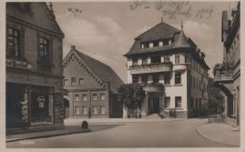 Hier geht es zur Karte mit dem Motiv 'Ein Geschäft und ein Hotel'
