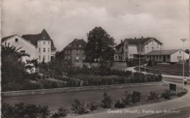 Hier geht es zur Karte mit dem Motiv 'Der Bahnhofsbereich in Geseke 1964'