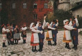 Hier geht es zur Karte mit dem Motiv 'Tanzgruppe in Trachten auf dem Wawel' Hier geht es zur Karte mit dem Motiv 'Tanzgruppe in Trachten auf dem Wawel'